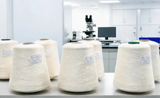 Industrial yarn cones with linear density labels